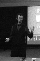 Thomas Woolley speaking at an event